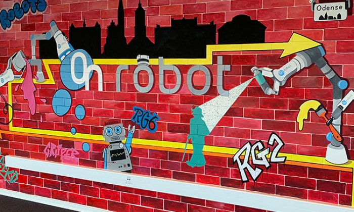 KAREN DODSON MURALS DECORATE ONROBOT OFFICES ALL OVER THE WORLD